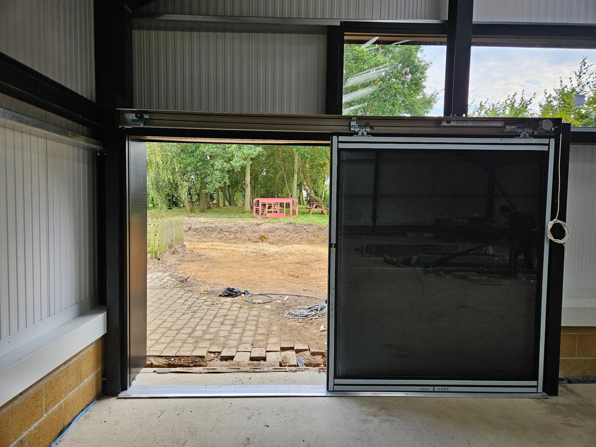 Algy's Norwich — aluminium curtain wall, shopfront and roller shutter installation – Prestige Aluminium Systems