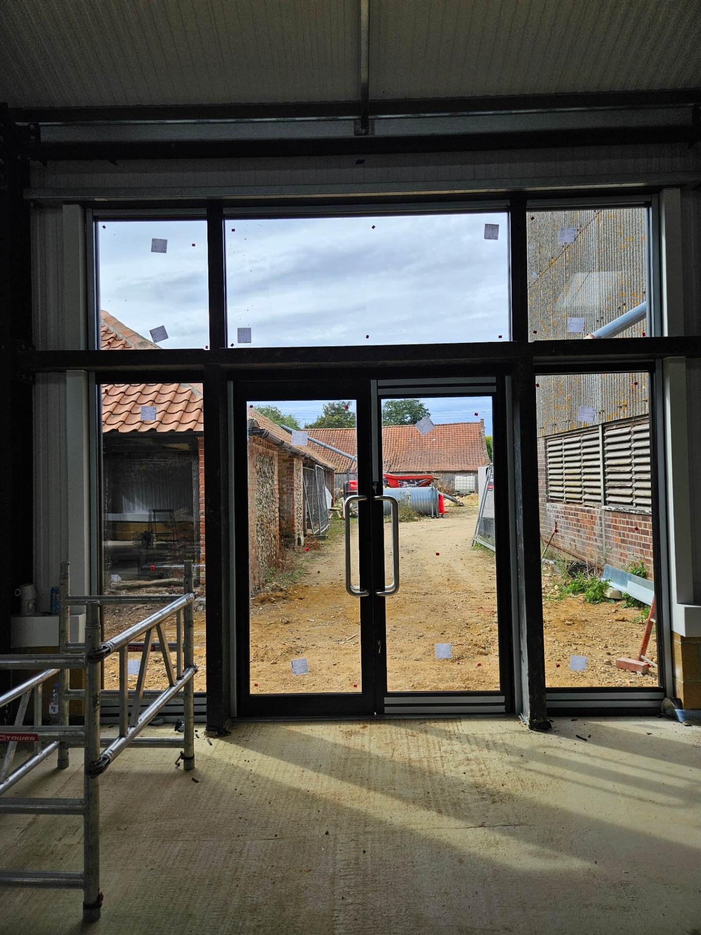 Algy's Norwich — aluminium curtain wall, shopfront and roller shutter installation – Prestige Aluminium Systems