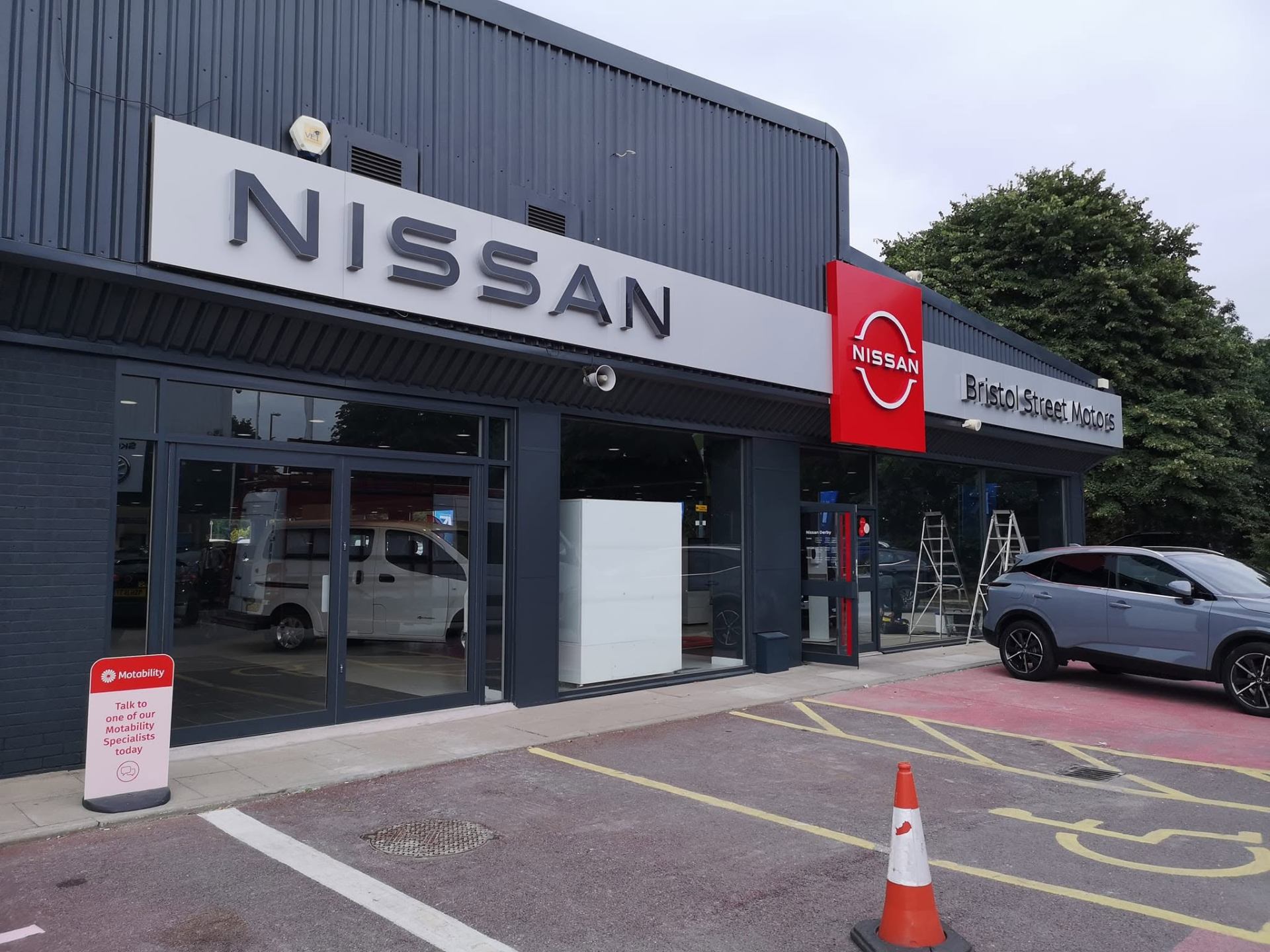 Nissan Derby Bristol Street Motors aluminium shopfront installation – Prestige Aluminium Systems